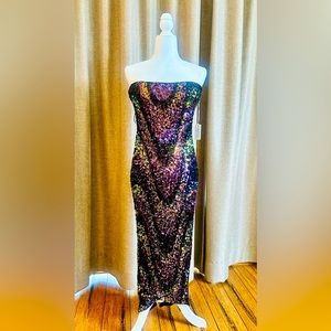 Glamorous sequenced strapless dress with golden, purple, green & black accents.